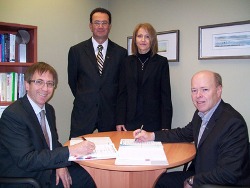 First row: Dr. Sylvain Loranger, President of QSAR and Mr. Jean-Pierre Sauriol, President and CEO of Dessau. Second row: Mr. Guy Meunier, Senior Vice President, Dessau and Mrs Lynda Perron, Executive Director, QSAR.