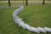 8,000 aircrete blocks were toppled yesterday (Sunday 26th July) in a 6km Domino Rally across London in a unique event staged by the winner of the Bank of America Create Art Award, Station House Opera