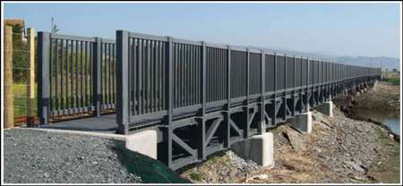 Strongwell’s EXTREN structural shapes, SAFPLANK interlocking decking system, and SAFPLATE gritted plate was selected by PIPEX Structural Composites, a distributor and fabricator of Strongwell, to build a pedestrian footbridge