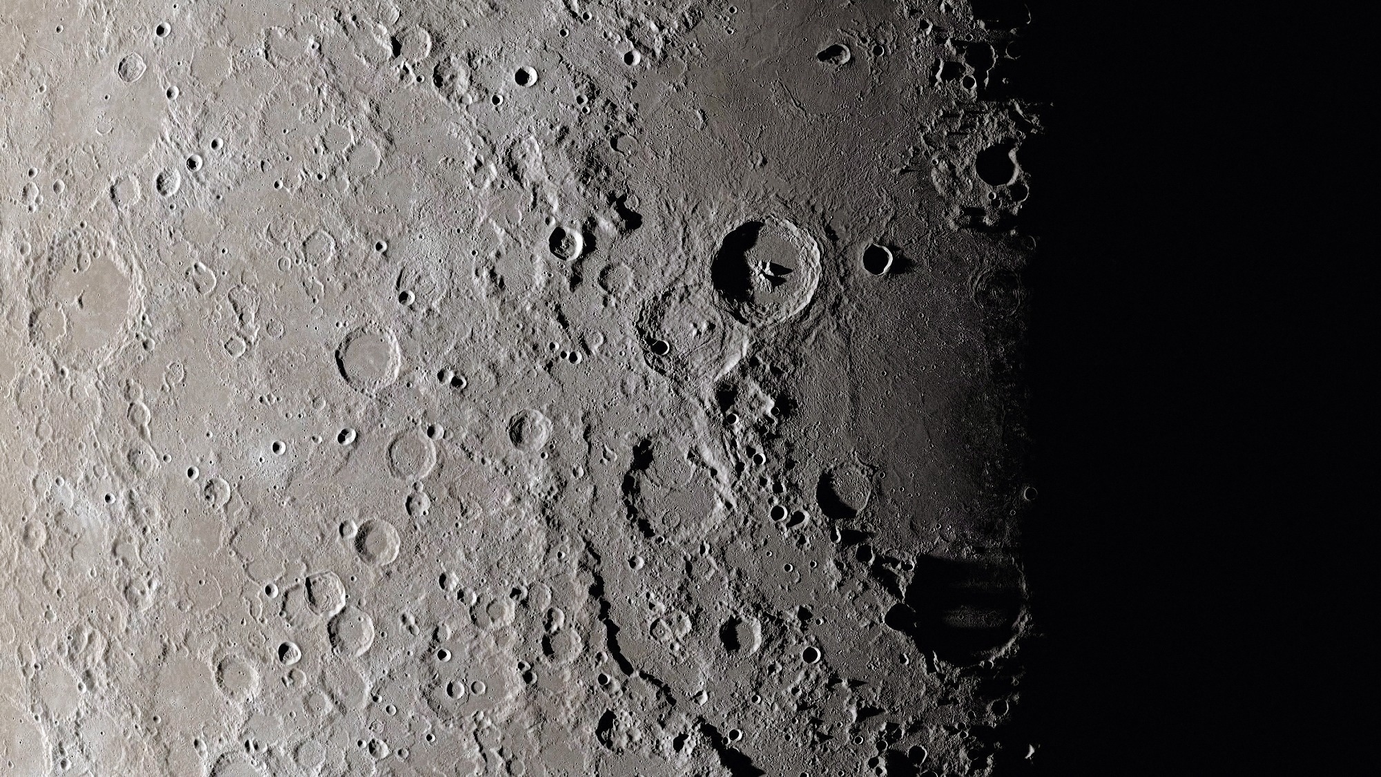 Moon surface close up. Craters and furrows on the surface of the earth