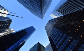 Do Fluid Viscous Dampers Between Adjacent Buildings Work Safely?