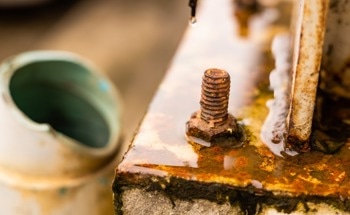 XRF as a Tool for Corrosion Analysis in Metallic Structures