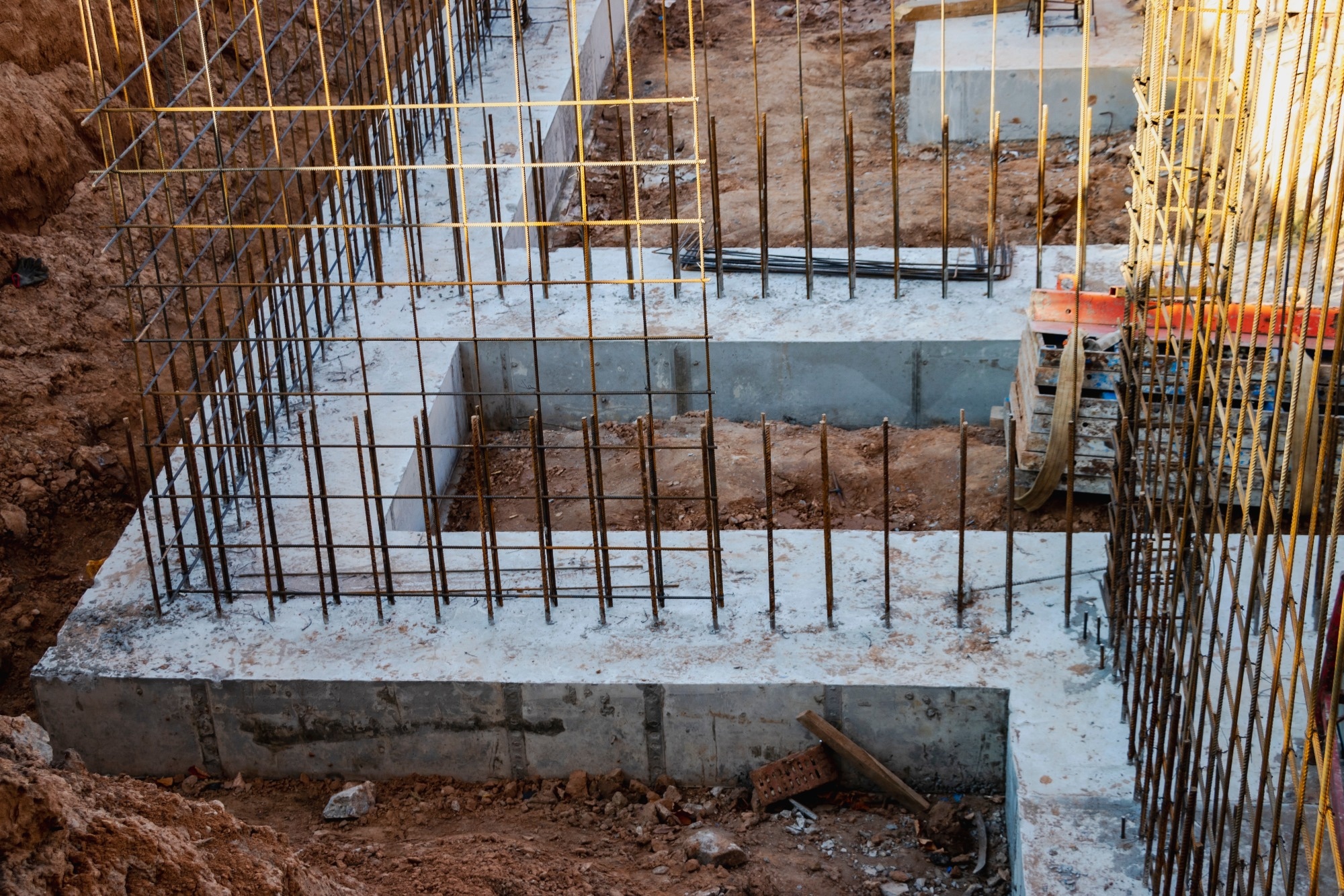 Compression-Casting Enhances Reinforced Concrete Strength
