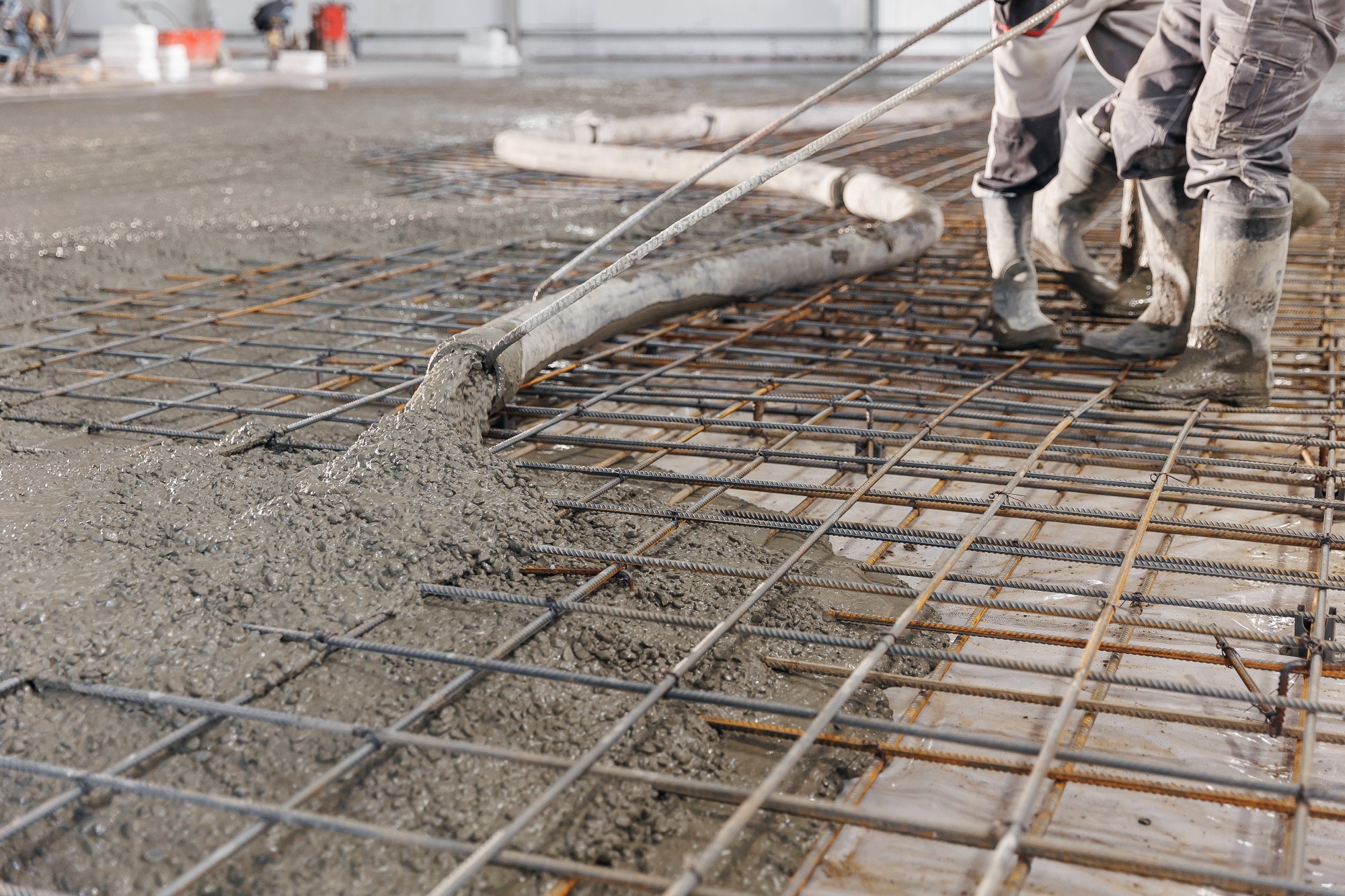 Concreting floors of buildings in construction site.