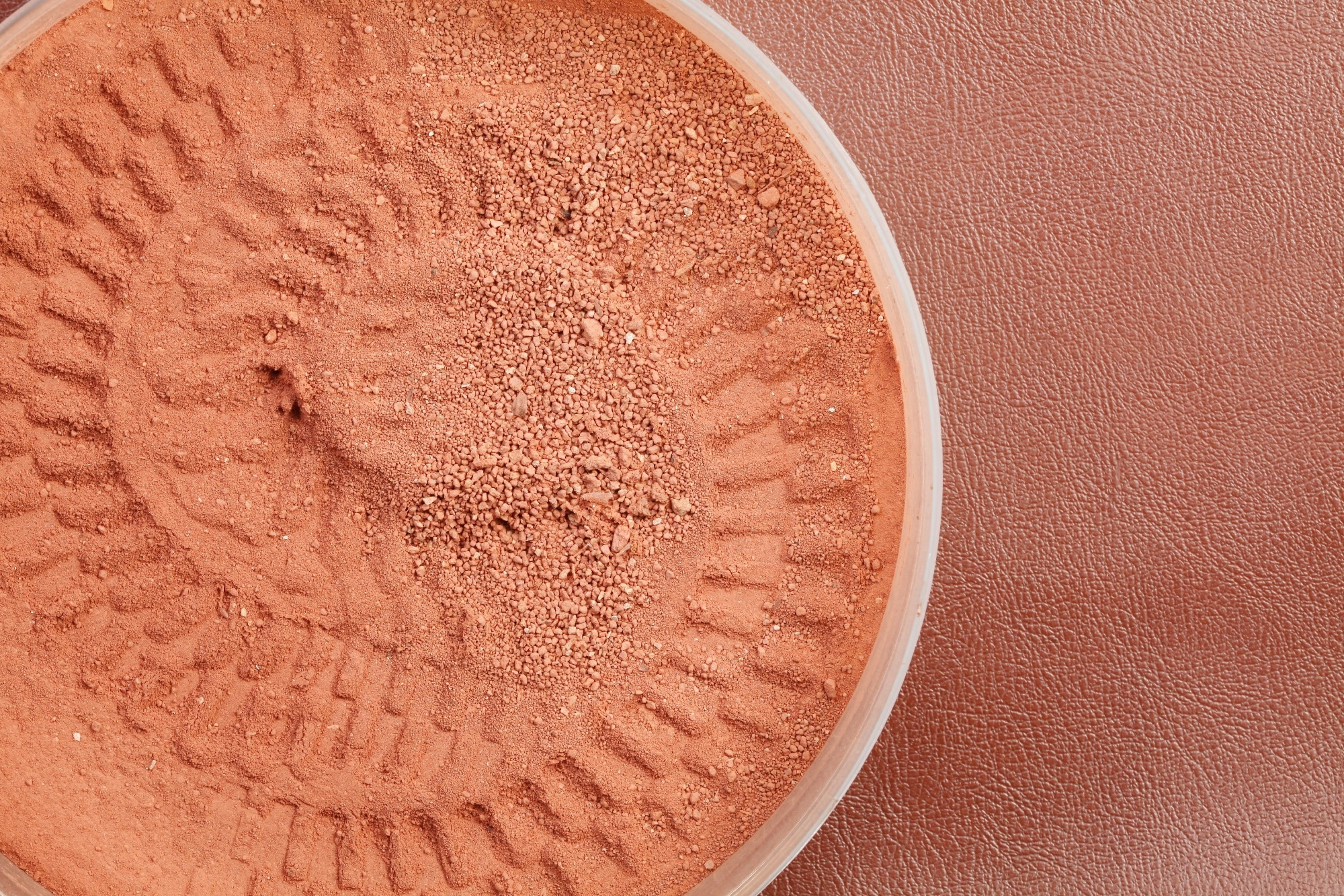 Laterite or red earth soil with tire stain represent a material for model railroad making technique represent the shape and texture surface background concept related idea.