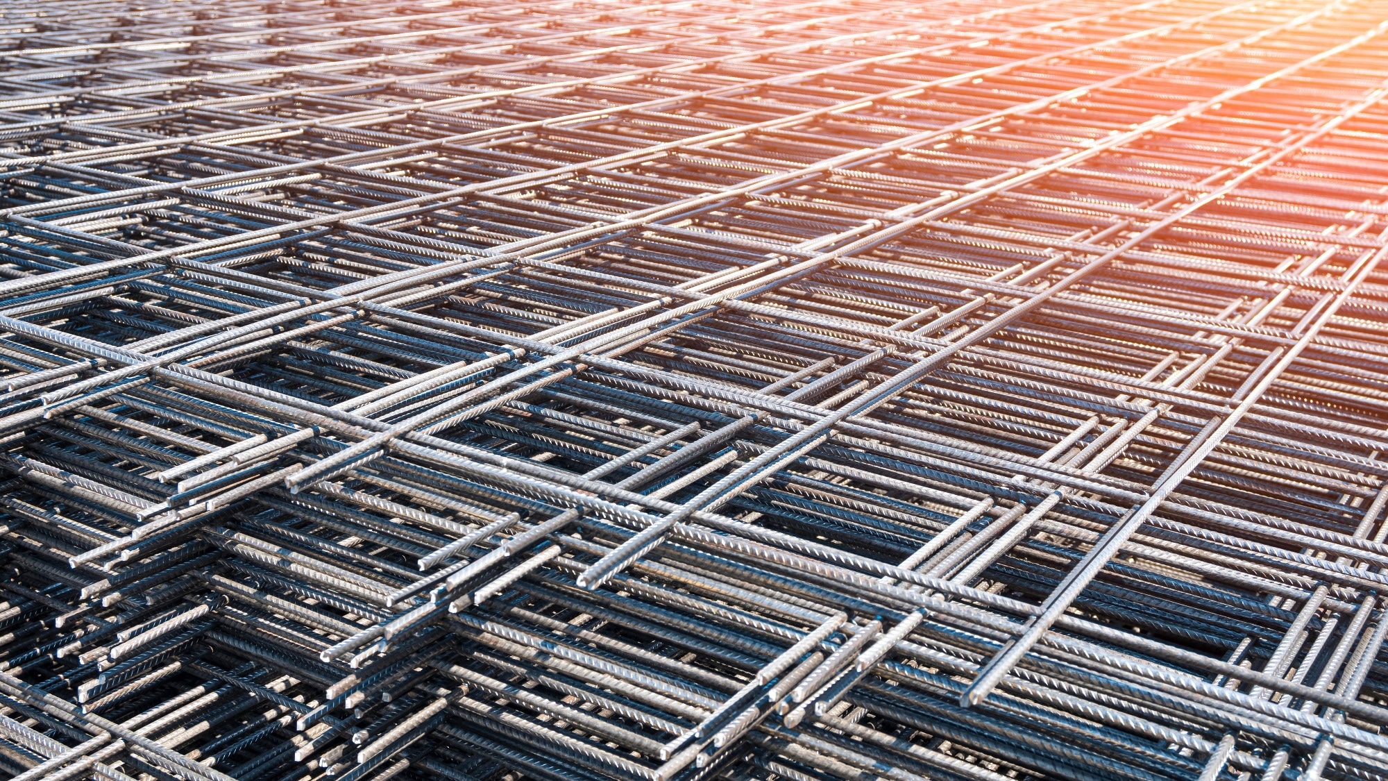 Pile of Black Wire Reinforcement Iron Grid Square Shape Stacked on the Floor in Industry yard.