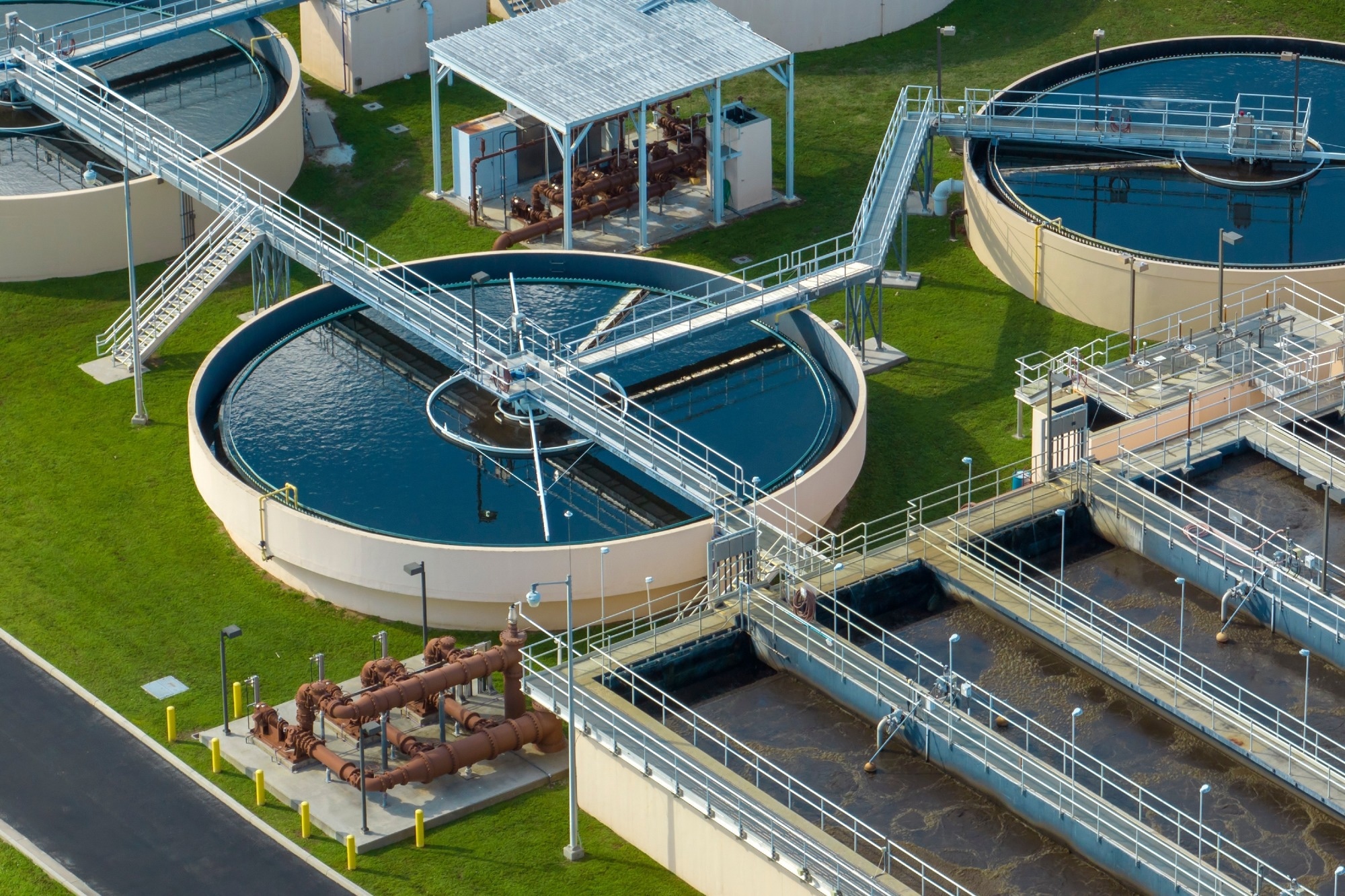 Aerial view of modern water cleaning facility at urban wastewater treatment plant.