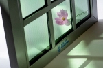 SolarWindow to Develop Tinted, Flexible Veneers that Generate Electricity on Glass