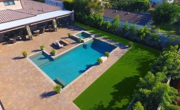 Artificial Grass Adds Entirely New Dimension to Hillside Pavers' Landscaping Projects