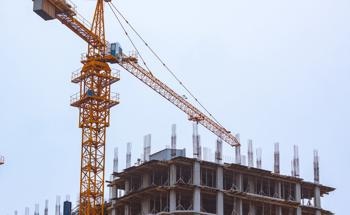 Evaluation of a Cellulose and Rice Husk-Based Insulation Material for Building Applications