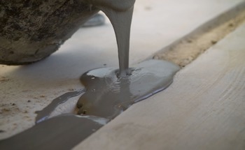 Evaluating Ilmenite Mud as a Substitute for Fly Ash in Cement