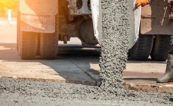 Using Waste Rock and Fiber Reinforcement to Produce Efficient, High-Performance Concrete