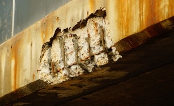 Steel Corrosion in Concrete Tied to Interface Flaws, Not Chloride Levels Alone