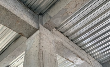 Steel I- and T-Sections Restore Strength in Concrete Beams Weakened by Web Openings
