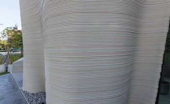 3D-Printed Concrete Gains Sponge-Inspired Toughness Through Layering