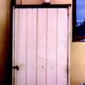 AZoBuild - Building Technology, Painted galvanized shed and concrete wall showing marked colour differences